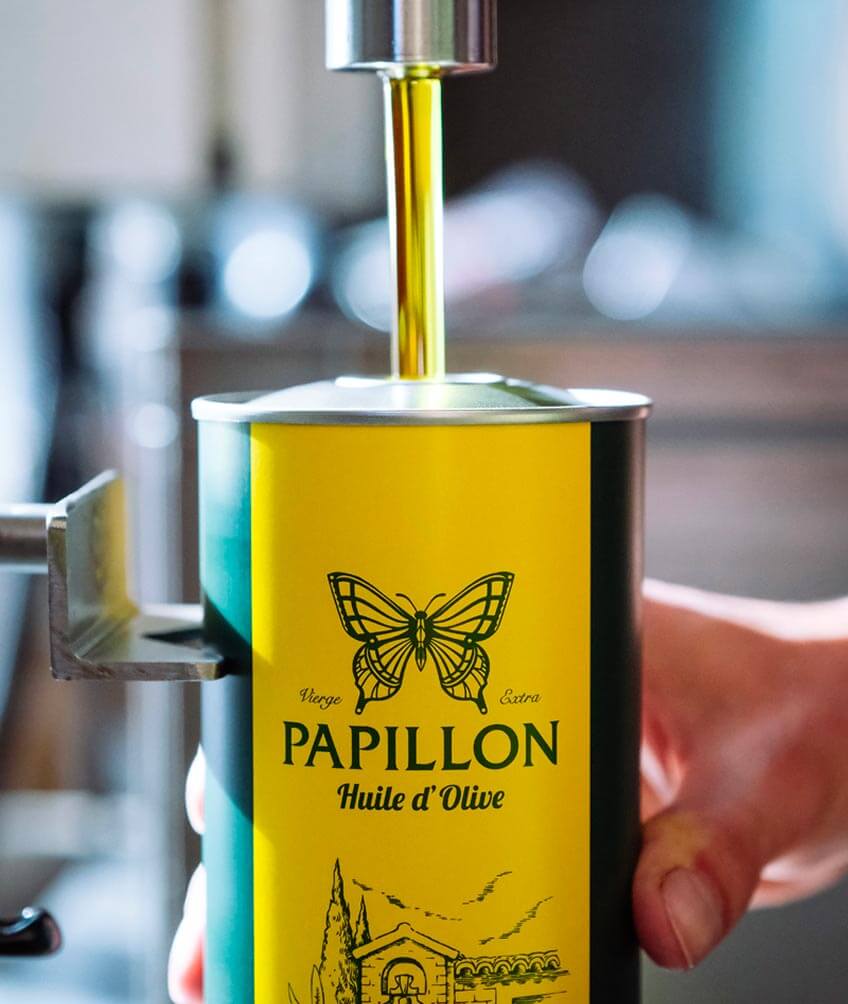 Le conditionnement de l'huile bio Papillon en bidon métallique